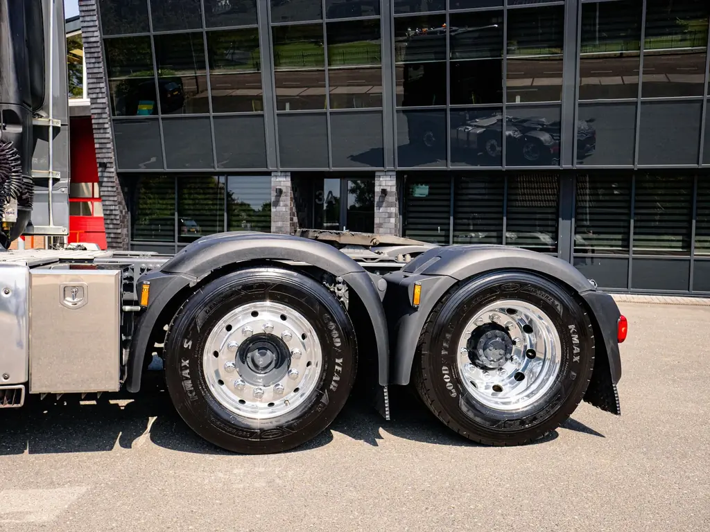 Close-up of a semi truck’s tandem drive axles and tires