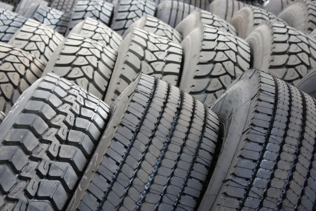 Stacked tires showing deep tread patterns